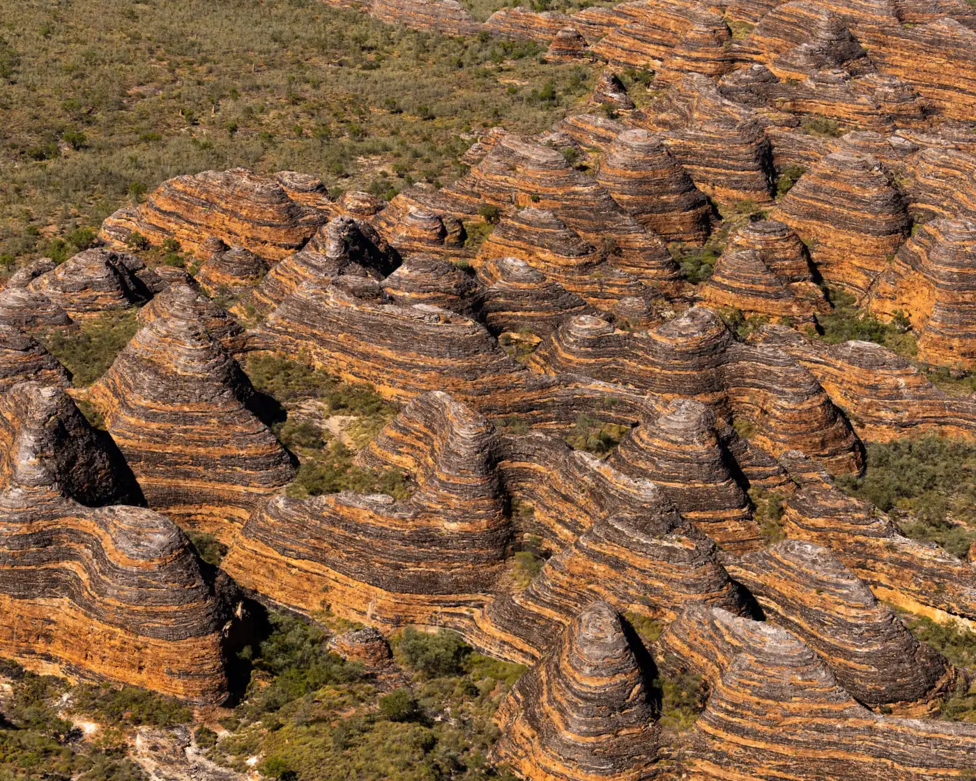 The striped beehive domes of the Bungle Bungle Range seen from the air